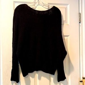 Black knitted sweater with adjustable back